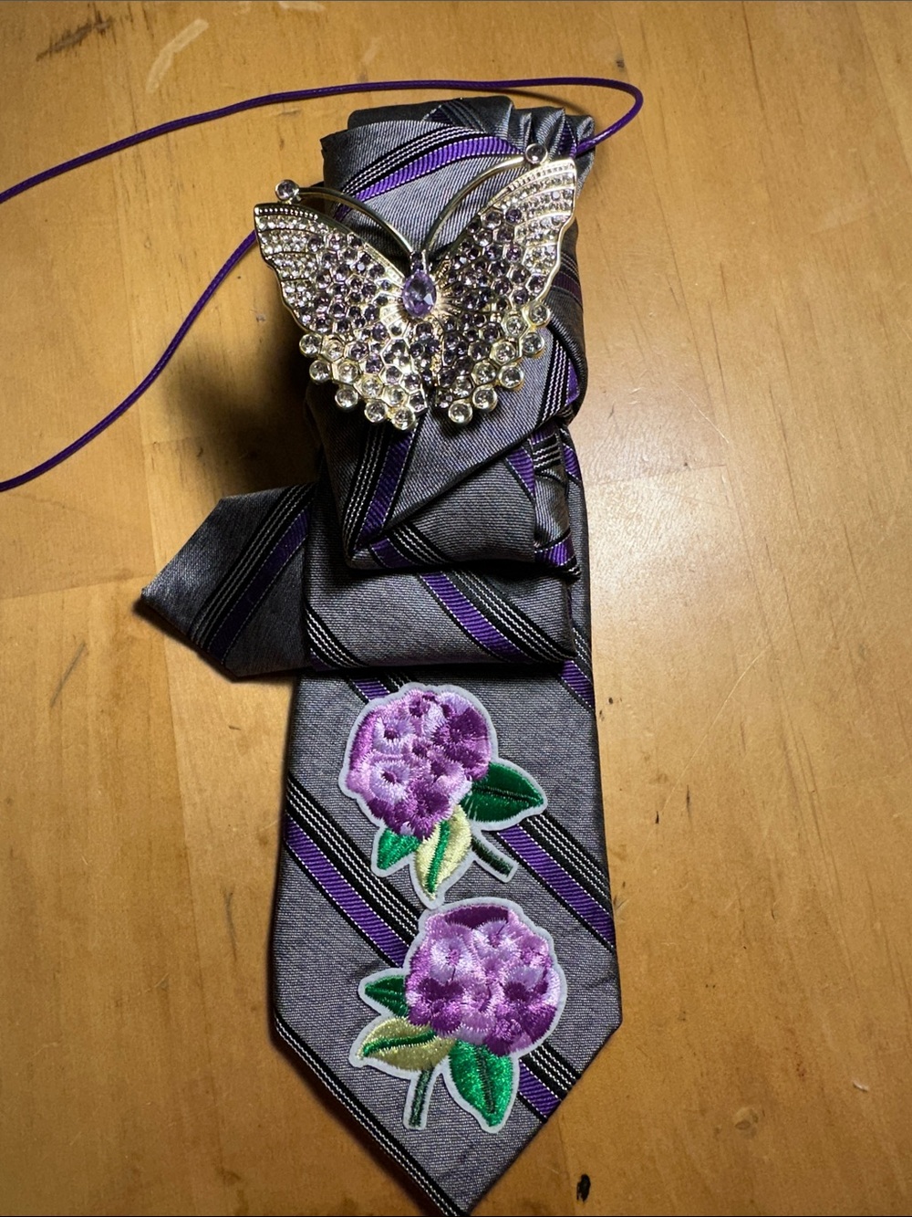 Calvin Klein Gray Tie with Purple Stripes and Floral Appliqués Butterfly Brooch